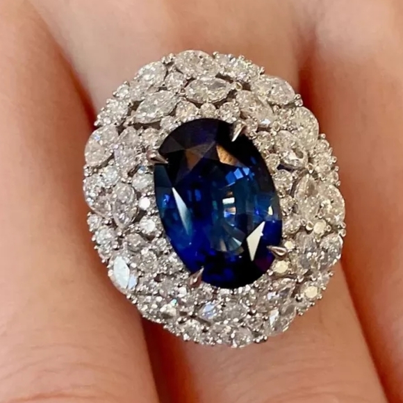 925 Silver Lab Created Blue Sapphire Oval Shaped Adjustable Ring - Picture 1 of 4